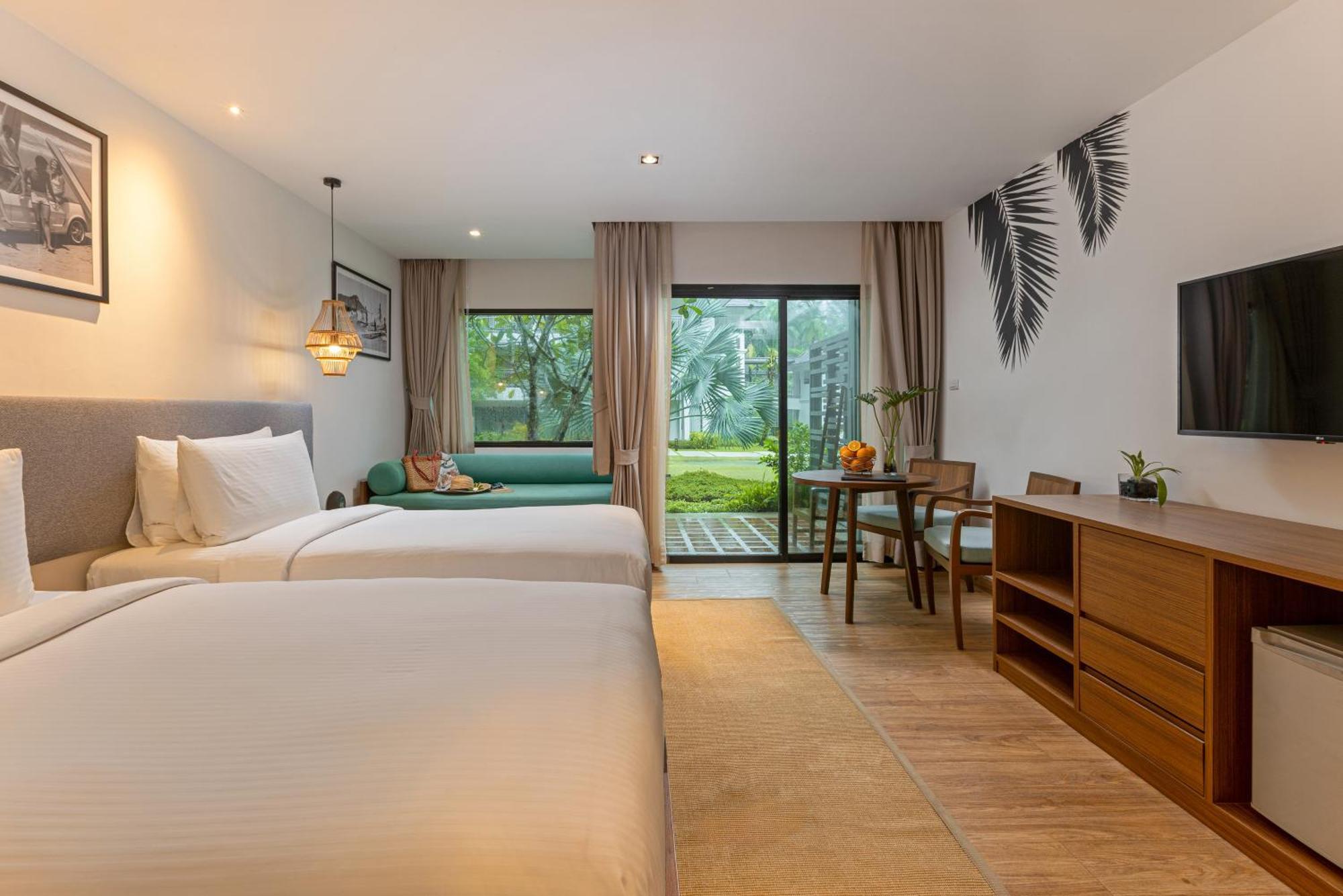 Deluxe Zimmer mit 2 Einzelbetten und Gartenterrasse